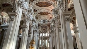 Stephens-Dom in Passau - Lower Bavaria Germany Interior view with a view of the altar and pulpit of St. Stephen's Cathedral in Passau - Lower Bavaria Germany
